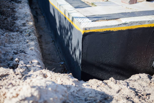 Professional Waterproofing technician working in DeForest, WI